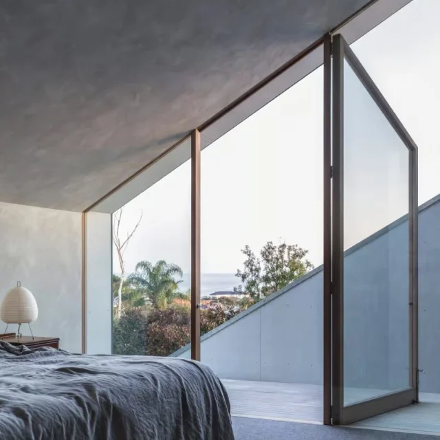 Jason Gibney of JGDW chose Murowash + sand to give a soft concrete look on this creative home